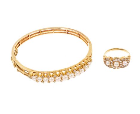 Late Victorian diamond and pearl hinged bangle and ring, the bangle with eleven graduated pearls flanked by graduated old cut
