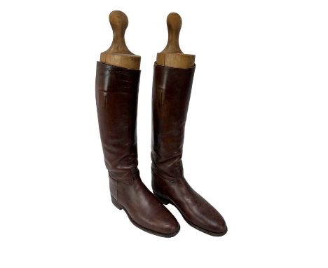 Pair of good quality brown leather hunting boots with wooden trees, believed size 9.5