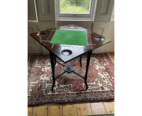 Late 19th century mahogany envelope card table, in the aesthetic style, with fold out top and side drawer, on ring turned leg