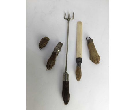 Group of Victorian and later animal pads as useful objects to include: Hare dated 1945, J. (P) H - Hardaspur, otter brooch, d