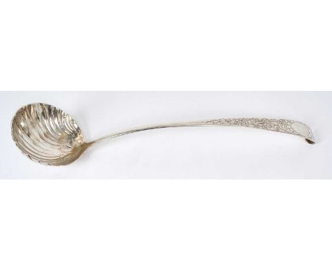 Rare mid eighteenth century Irish provincial silver soup ladle, with shell bowl and floral engraved crooked handle (circa 175
