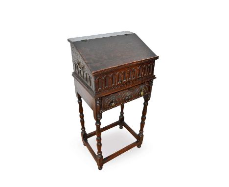 17th century oak bible box on later stand, with box with ledge and arcaded frieze raised on integral stand with frieze drawer