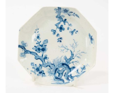 Worcester octagonal saucer, circa 1755, painted in blue with the Prunus Root pattern, workman’s mark, 10.5cm acrossProvenance