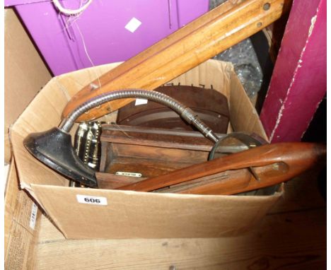 A poseable desk magnifying glass, desk inkwell, bakelite timepiece and two loom shuttles