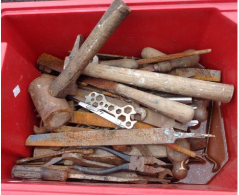 A crate containing assorted tools