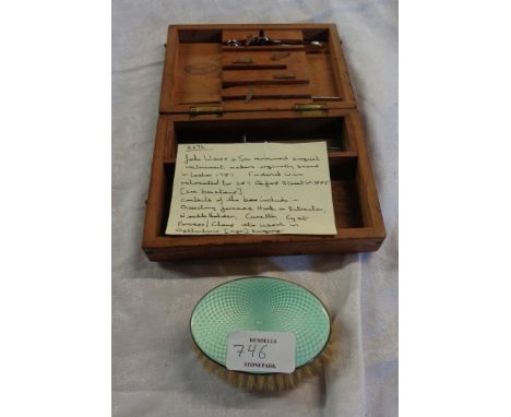 A silver and enamel back brush - sold with J. Weiss &amp; Son Ltd. surgical instrument box with four stainless steel instrume