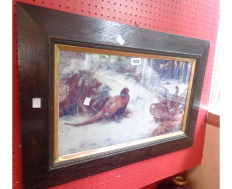 Archibald Thorburn: An oak framed coloured print depicting pheasants in a winter landscape