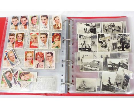 A ring bound album containing cigarette cards including John Player's Film Stars, various senior service photographic series 