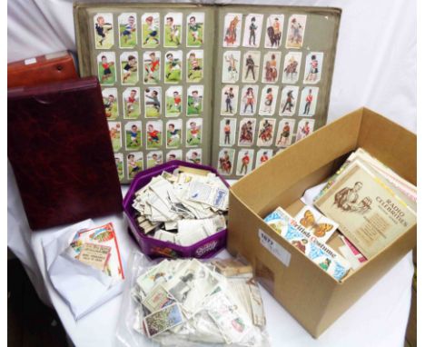 A box containing a large collection of cigarette and other trade cards including Turf, Player's, Wills' and State Express, et