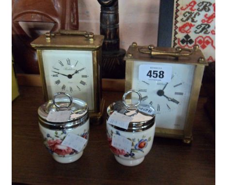 A pair of Royal Worcester oven to tableware porcelain egg coddlers - sold with two quartz movement carriage clocks