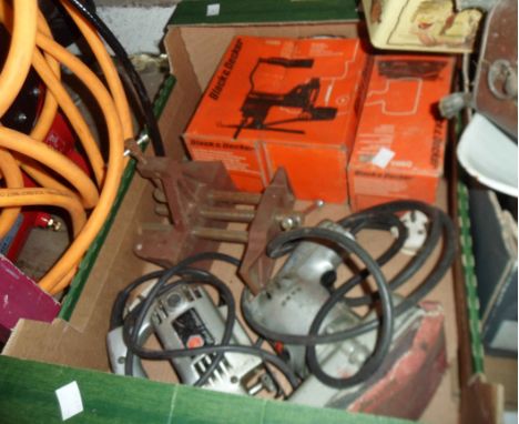 A box containing Black &amp; Decker and other tools