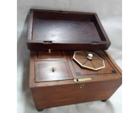 A Victorian mahogany tea caddy with fitted interior - mixing bowl missing - for restoration