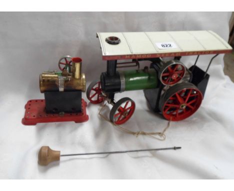 A vintage Mamod steam tractor - sold with a similar stationary engine - burners missing