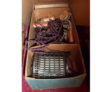 A vintage Pathescope cine projector and films including Charlie Chaplin, Mickey Mouse, etc., in its original box