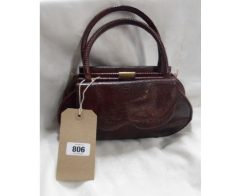 A vintage Offenthal, Paris reptile skin handbag with matching compact case