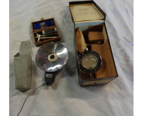 A vintage boxed Patent Optic Pearl measuring tap for Black and White Whisky - sold with a wooden cased Wilkinson safety razor