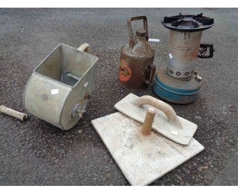 An Aladdin's pink, paraffin stove, plasterer's gun and tools