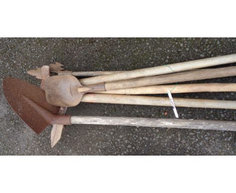A quantity of long handled garden tools