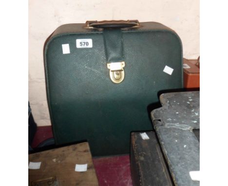 A vintage Hermes 2000 portable typewriter, in light green colourway with original leather hard case