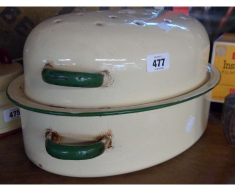 A large old enamel roasting tin in the cream and green colourway - sold with a smaller cream and blue similar
