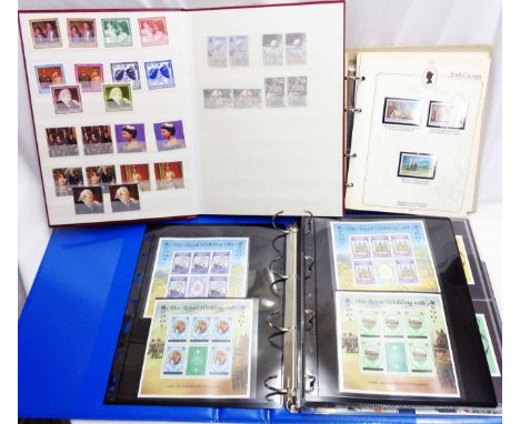 A red stock book containing a collection of mint Commonwealth Queen Elizabeth II commemorative stamps - sold with a Silver Ju