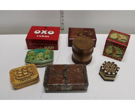 A selection of vintage tins and treen items 