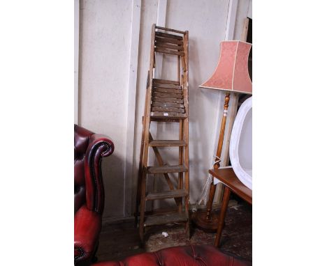 A vintage pair of of Lewis's Standex wooden ladders. No Shipping 