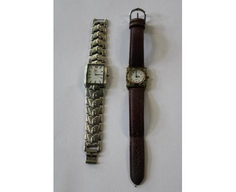 A swiss stainless steel men's watch and a ladies watch with enamel decoration 