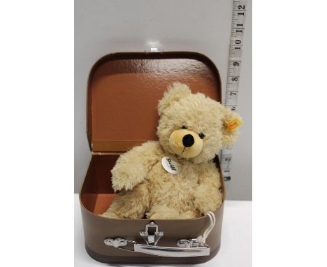 A Steiff teddy bear in suitcase 