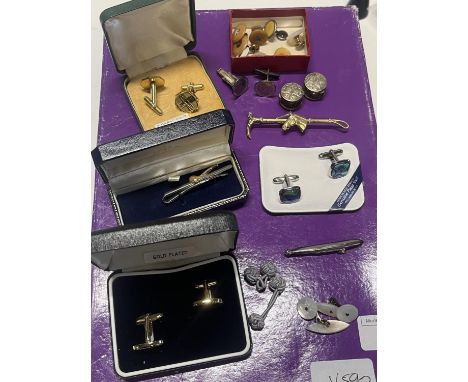 A selection of vintage cufflinks, tie pins etc 