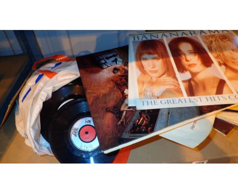 Shelf of LPs and singles London Boys to Shirley Bassey 