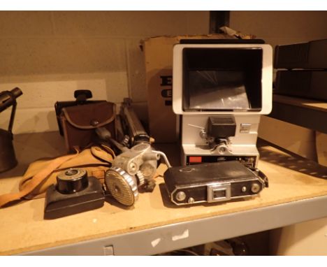 Group of vintage folding and box cameras with a tripod and Elmo editor  CONDITION REPORT: All electrical items in this lot ha