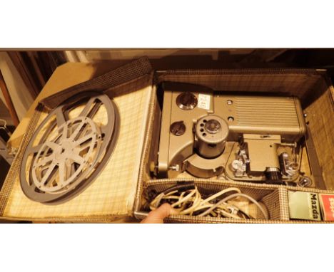 Cased Eumig Specto projector 16 mm with spare bulbs  CONDITION REPORT: All electrical items in this lot have been PAT tested 