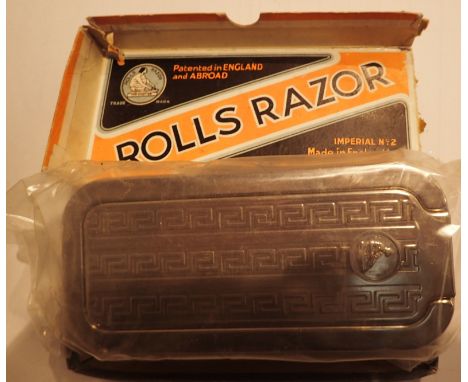 Boxed Vintage Rolls razor 