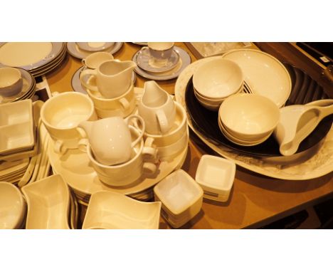 Shelf of ceramics to include dinner plates and soup bowls 