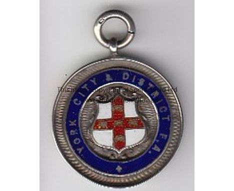 YORK FA  1928    Silver medal in original box, made by Vaughtons, York City and District FA, hall-marked  and engraved Minor 