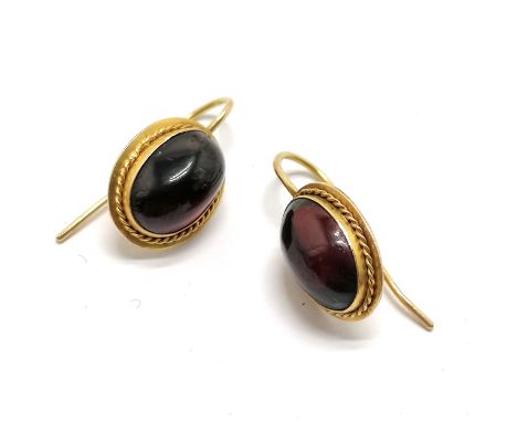 Pair of antique unmarked (touch tests as 15ct) gold cabochon garnet stone set earrings - 2cm &amp; 3.5g total weight