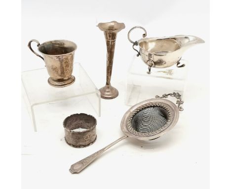 Qty of silver inc sauce boat, christening tankard, unmarked tea strainer, napkin ring &amp; (loaded) spill vase - total weigh