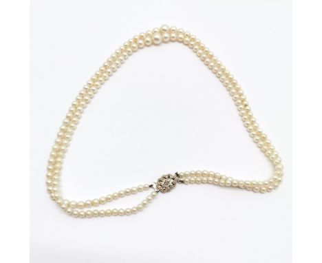 Double graduated strand of pearls with 9ct white gold clasp - 40cm long