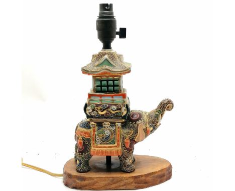 Vintage Japanese satsuma elephant figural lampbase with pagoda detail and has wooden base - 32cm high ~ some wear to gilding 