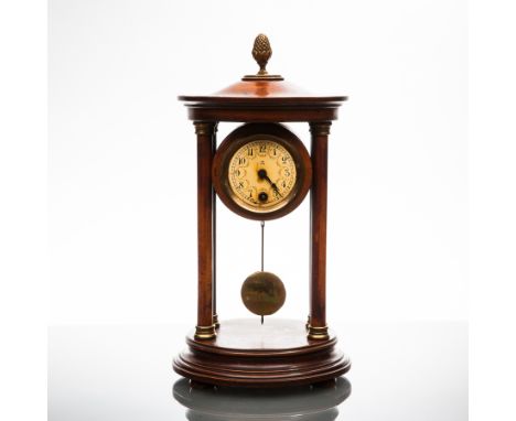 EARLY TWENTIETH CENTURY MAHOGANY CASED HAC PORTICO CLOCK
single train key wind movement, the circular dial with Roman numeral