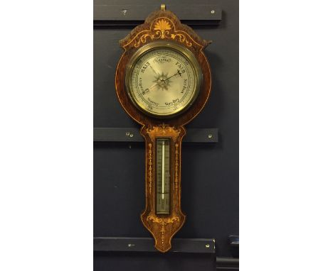 VICTORIAN INLAID MAHOGANY WALL MOUNTED BAROMETER
with unsigned 7.5 inch silvered dial, inlaid with scrolling floral marquetry