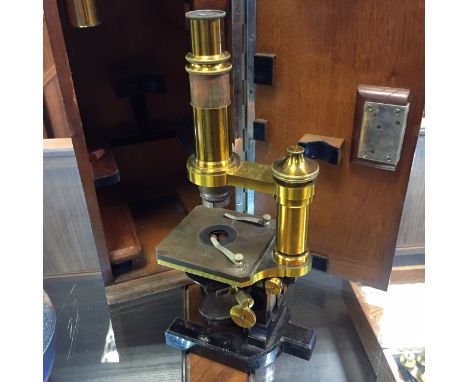 CASED BRASS MONOCULAR MICROSCOPE BY CARL ZEISS, JENA
early twentieth century, lacquered brass and ebonised finish, the arm si