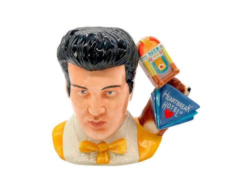 Jukebox, records, Heartbreak Hotel, Hound Dog, and keyboard handle. Portrays Elvis singing one of his most famous tracks of a