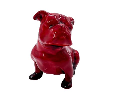 Rich red glaze, modeled as a seated bulldog. Model 120. Doulton stamped to bottom. 120 engraved to bottom. Issued: c. 1913Dim
