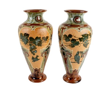 Pate-sur-pate decoration of sparrows on grape and modelled foliate forms in Art Nouveau style. Artist incised on bottom of bo