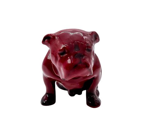 Style three, rich red glaze modeled as a seated bulldog. Model no. 122. Stamped Flambe. Issued: c. 1913 - 1946Dimensions: 2.2