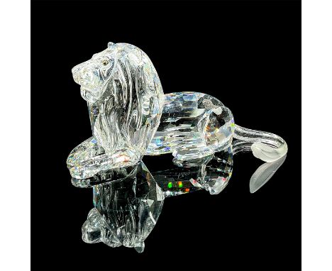 The third figure of the "Inspiration Africa". A clear faceted figure with tawny eyes and frosted tip tail. Swarovski mark. Th