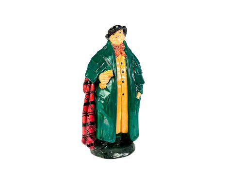 Green overcoat, tan undercoat, black hat, red and black scarf.Glazed porcelain, Royal Doulton backstamp. Artist: Charles Noke