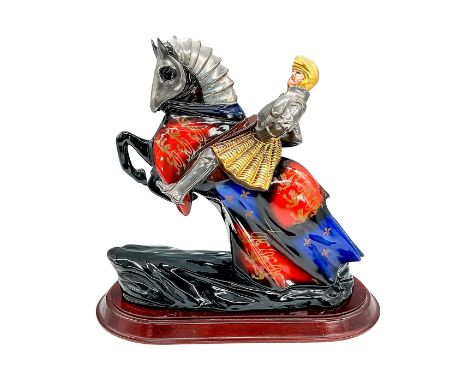 Model 41. Hand painted fine china figure of the infamous king in full armor with armor on his horse. Gold helmet and skirt. S